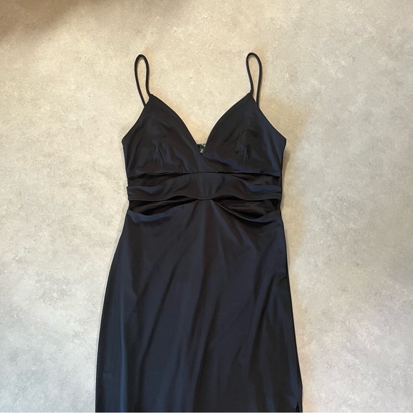 Dynamite Black Dress. Small. Long. Lined. Cut outs on the top. Stretchy. Slit. - Picture 1 of 5